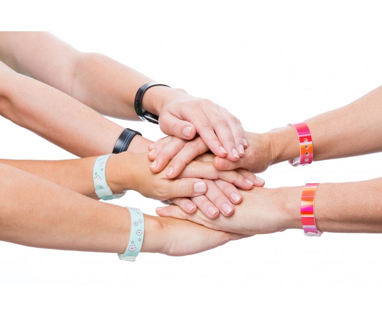 Hands all in together each wearing different colors of Psi Bands